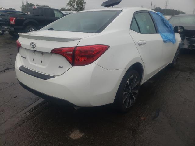 Photo 3 VIN: 2T1BURHE1JC099145 - TOYOTA COROLLA L 