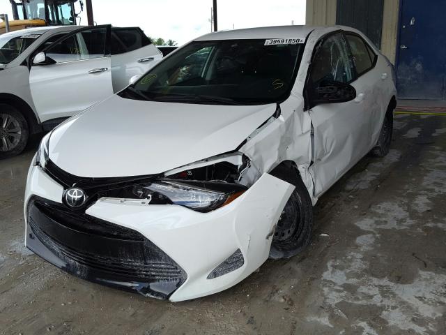 Photo 1 VIN: 2T1BURHE1JC105851 - TOYOTA COROLLA L 