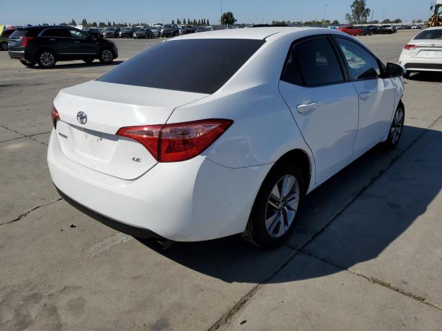 Photo 3 VIN: 2T1BURHE1JC971310 - TOYOTA COROLLA L 