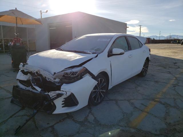 Photo 1 VIN: 2T1BURHE1KC125714 - TOYOTA COROLLA L 