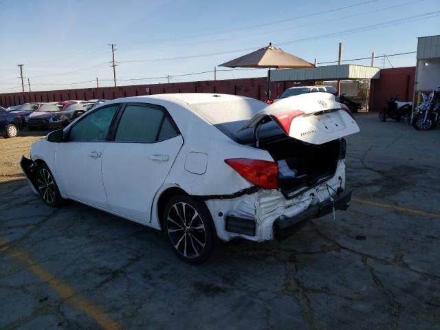 Photo 2 VIN: 2T1BURHE1KC125714 - TOYOTA COROLLA L 