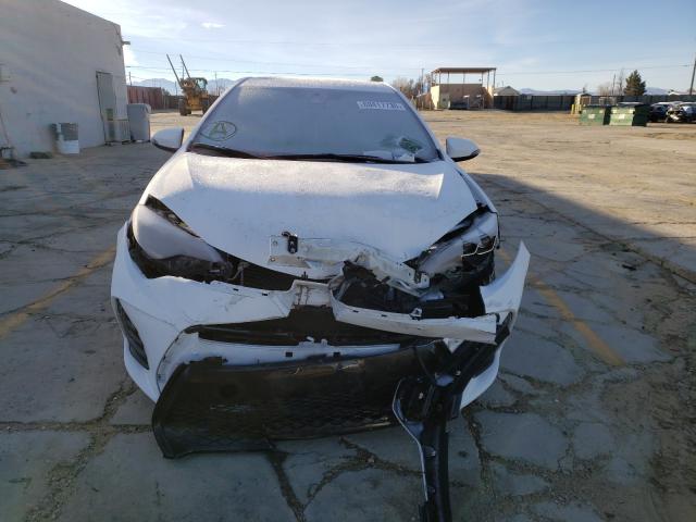 Photo 8 VIN: 2T1BURHE1KC125714 - TOYOTA COROLLA L 