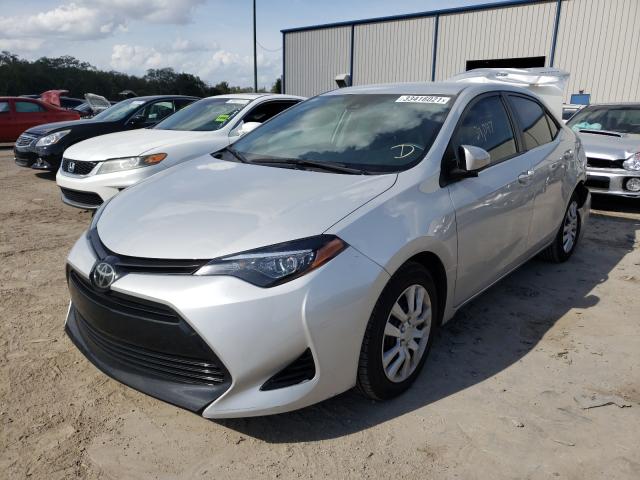 Photo 1 VIN: 2T1BURHE1KC126474 - TOYOTA COROLLA L 