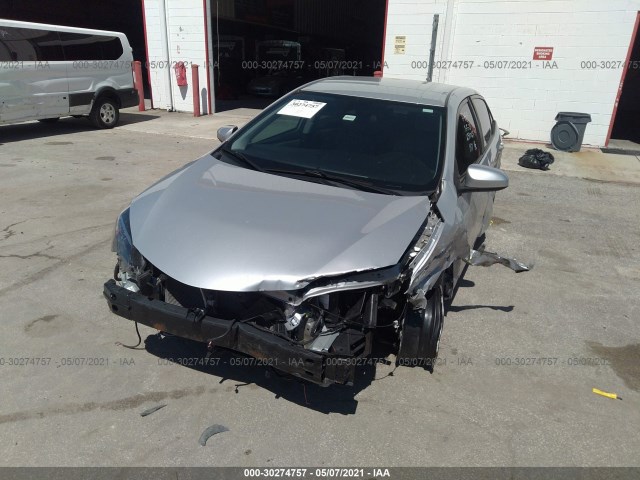 Photo 5 VIN: 2T1BURHE1KC132873 - TOYOTA COROLLA 