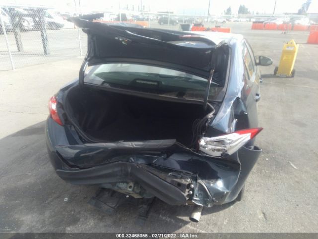 Photo 5 VIN: 2T1BURHE1KC152833 - TOYOTA COROLLA 