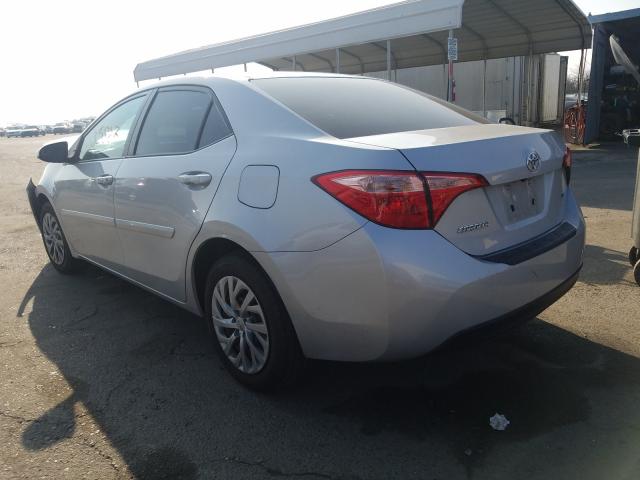 Photo 2 VIN: 2T1BURHE1KC158633 - TOYOTA COROLLA L 