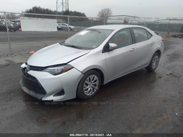 Photo 1 VIN: 2T1BURHE1KC165713 - TOYOTA COROLLA 