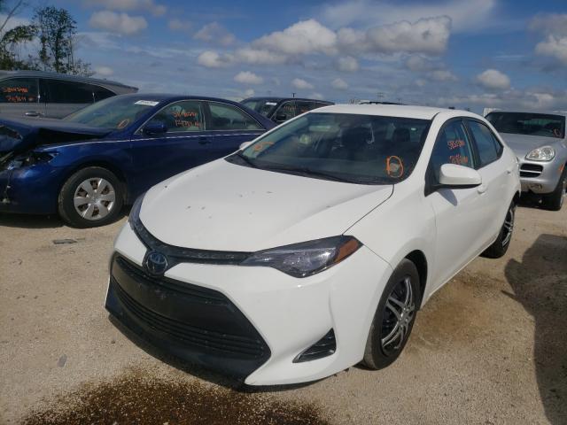 Photo 1 VIN: 2T1BURHE1KC202162 - TOYOTA COROLLA L 