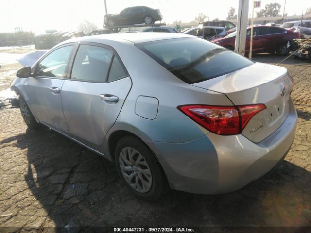 Photo 2 VIN: 2T1BURHE1KC209595 - TOYOTA COROLLA 