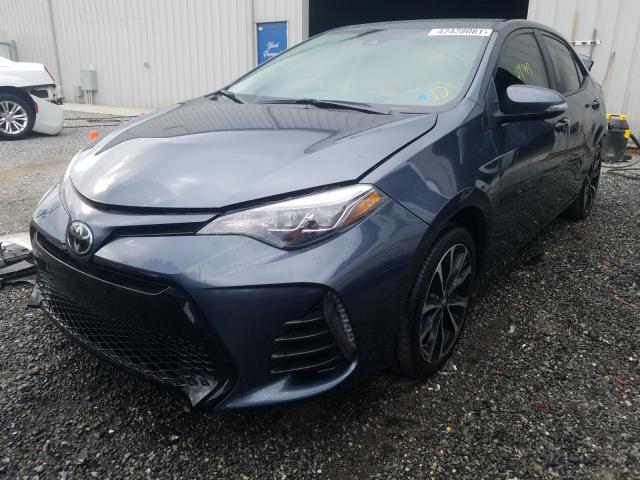 Photo 1 VIN: 2T1BURHE1KC216823 - TOYOTA COROLLA L 