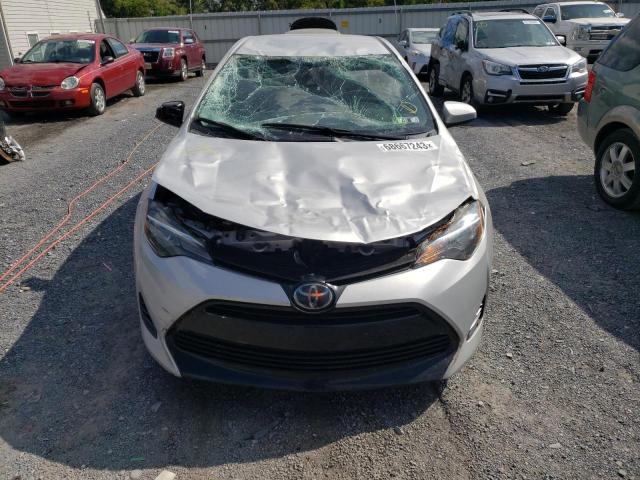 Photo 4 VIN: 2T1BURHE1KC221827 - TOYOTA COROLLA L 