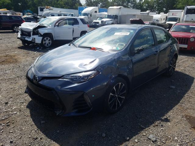 Photo 1 VIN: 2T1BURHE1KC235890 - TOYOTA COROLLA L 