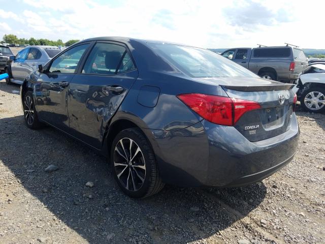 Photo 2 VIN: 2T1BURHE1KC235890 - TOYOTA COROLLA L 