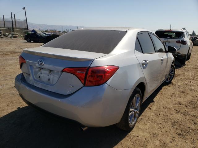 Photo 3 VIN: 2T1BURHE1KC246906 - TOYOTA COROLLA L 