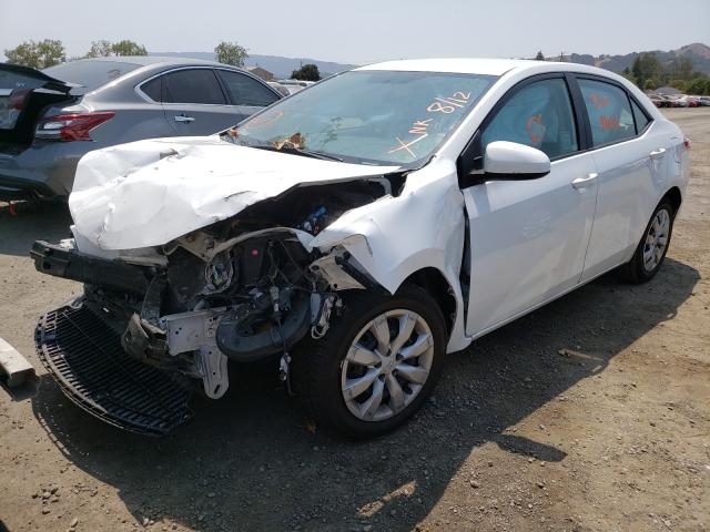 Photo 1 VIN: 2T1BURHE2EC111325 - TOYOTA COROLLA L 