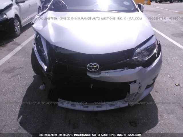 Photo 5 VIN: 2T1BURHE2GC738559 - TOYOTA COROLLA 