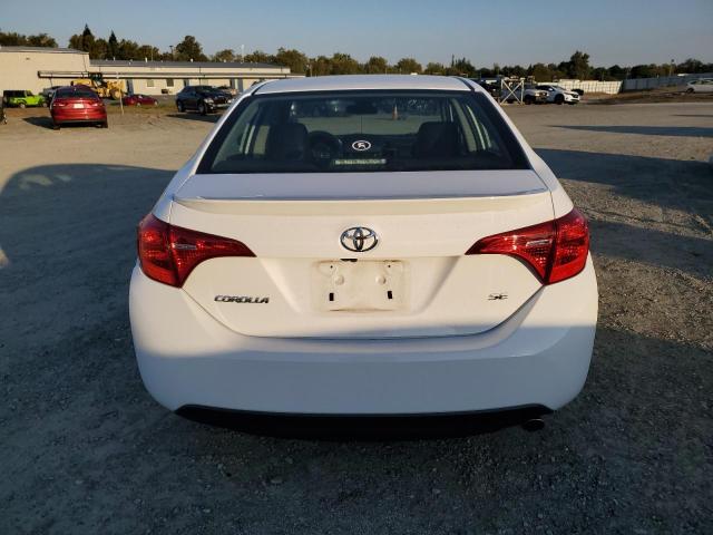 Photo 5 VIN: 2T1BURHE2HC844849 - TOYOTA COROLLA L 