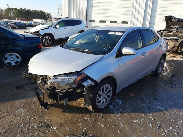 Photo 1 VIN: 2T1BURHE2JC000008 - TOYOTA COROLLA L 