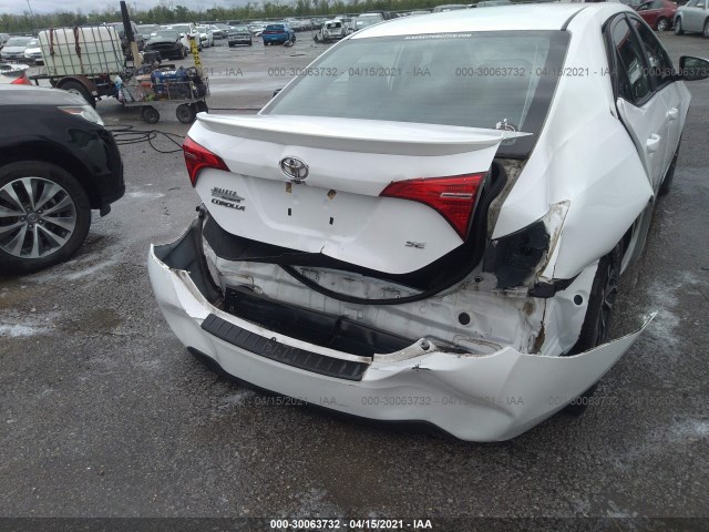 Photo 5 VIN: 2T1BURHE2JC012742 - TOYOTA COROLLA 