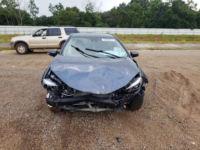 Photo 8 VIN: 2T1BURHE2JC015477 - TOYOTA COROLLA L 