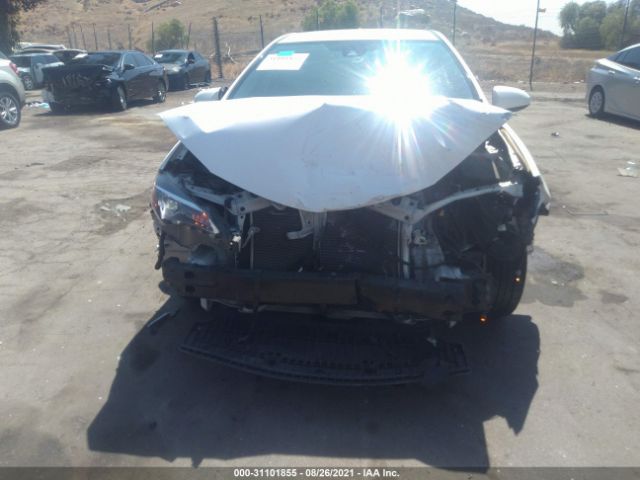 Photo 5 VIN: 2T1BURHE2JC029542 - TOYOTA COROLLA 