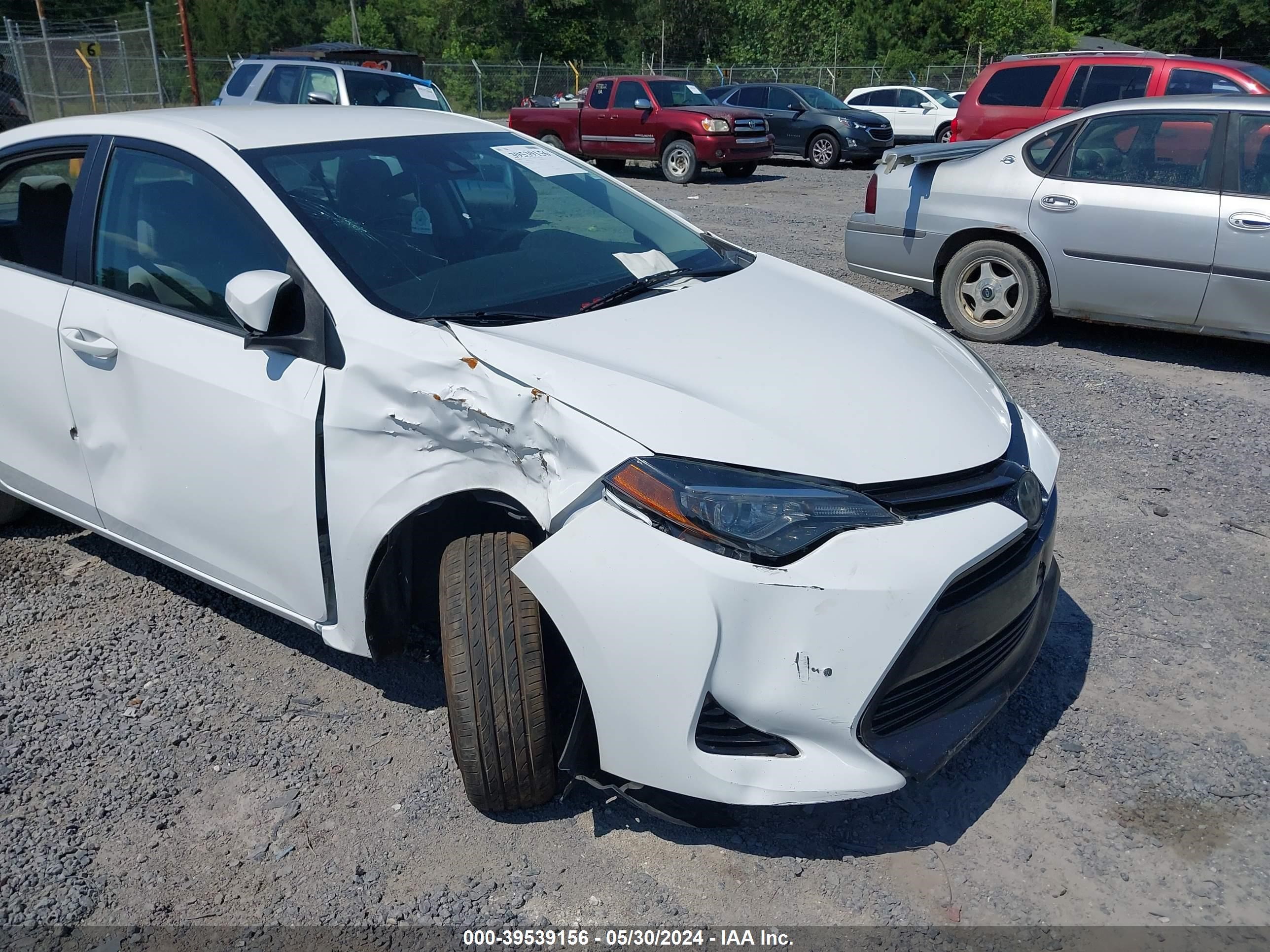 Photo 5 VIN: 2T1BURHE2JC062900 - TOYOTA COROLLA 