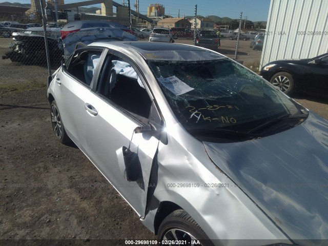 Photo 5 VIN: 2T1BURHE2JC071824 - TOYOTA COROLLA 