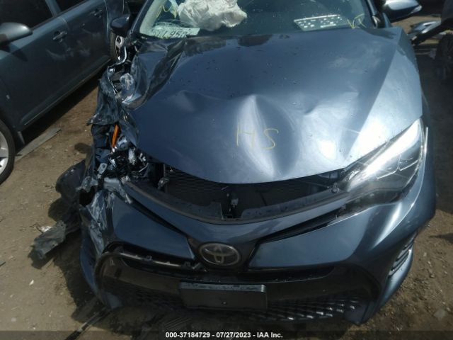 Photo 9 VIN: 2T1BURHE2JC074349 - TOYOTA COROLLA 