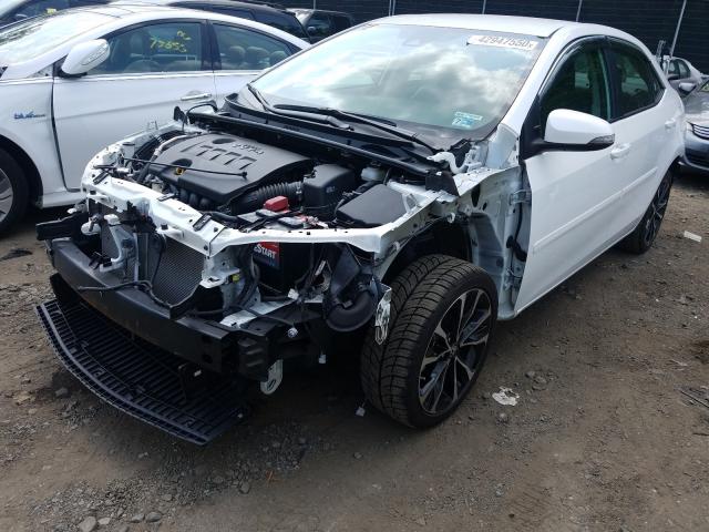 Photo 1 VIN: 2T1BURHE2JC076800 - TOYOTA COROLLA L 