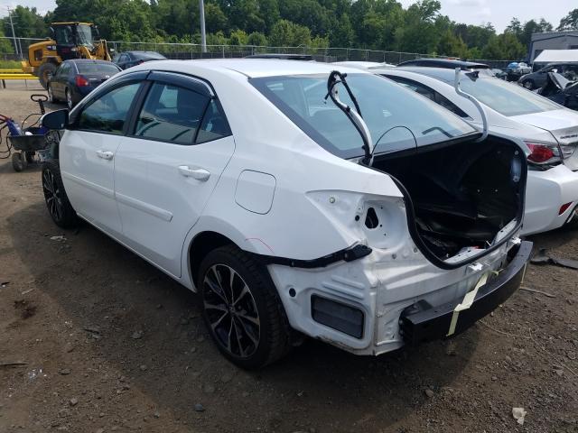 Photo 2 VIN: 2T1BURHE2JC076800 - TOYOTA COROLLA L 