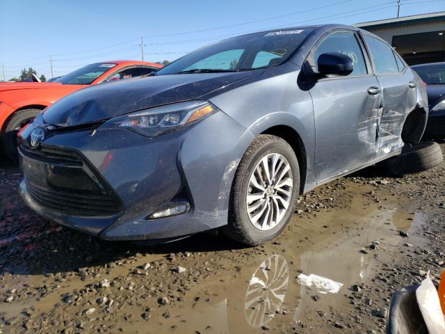 Photo 1 VIN: 2T1BURHE2JC091653 - TOYOTA COROLLA L 