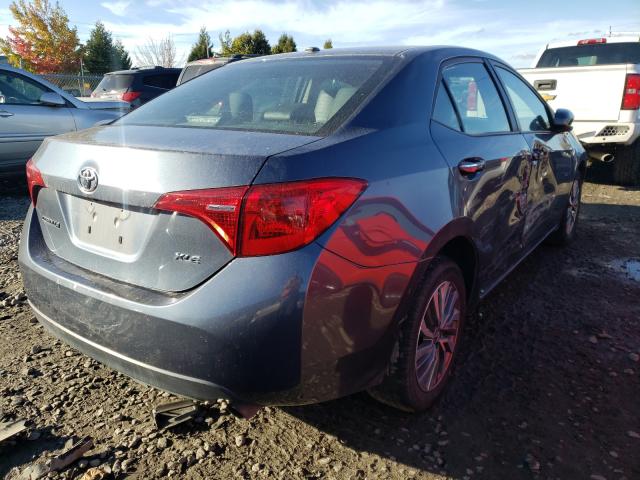 Photo 3 VIN: 2T1BURHE2JC091653 - TOYOTA COROLLA L 