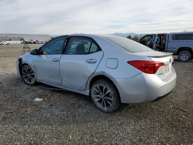 Photo 1 VIN: 2T1BURHE2JC107267 - TOYOTA COROLLA 