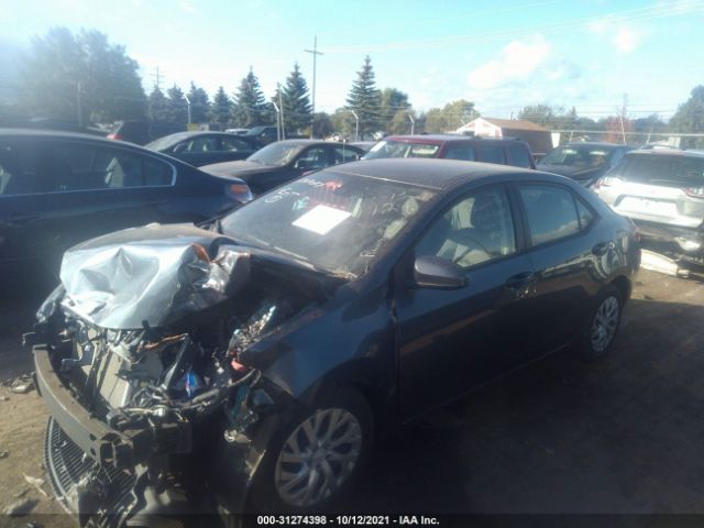 Photo 1 VIN: 2T1BURHE2JC977729 - TOYOTA COROLLA 