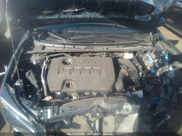 Photo 9 VIN: 2T1BURHE2JC977729 - TOYOTA COROLLA 