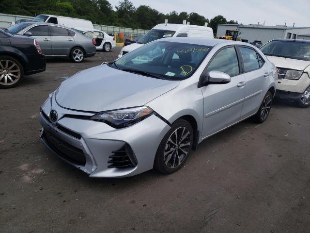 Photo 1 VIN: 2T1BURHE2KC131649 - TOYOTA COROLLA L 