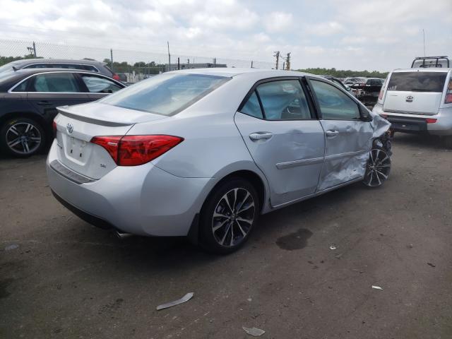 Photo 3 VIN: 2T1BURHE2KC131649 - TOYOTA COROLLA L 