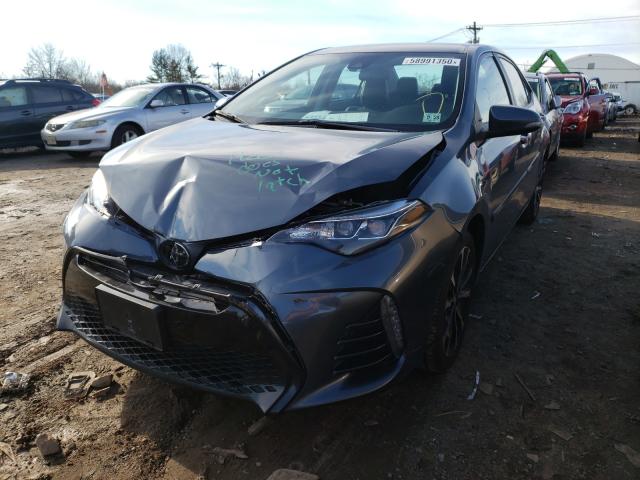 Photo 1 VIN: 2T1BURHE2KC139489 - TOYOTA COROLLA L 