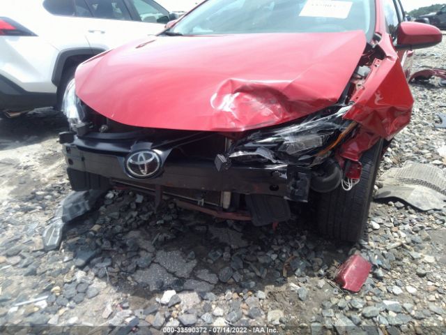 Photo 5 VIN: 2T1BURHE2KC204325 - TOYOTA COROLLA 