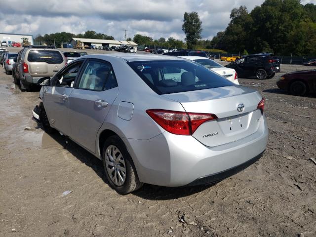 Photo 2 VIN: 2T1BURHE2KC218922 - TOYOTA COROLLA L 