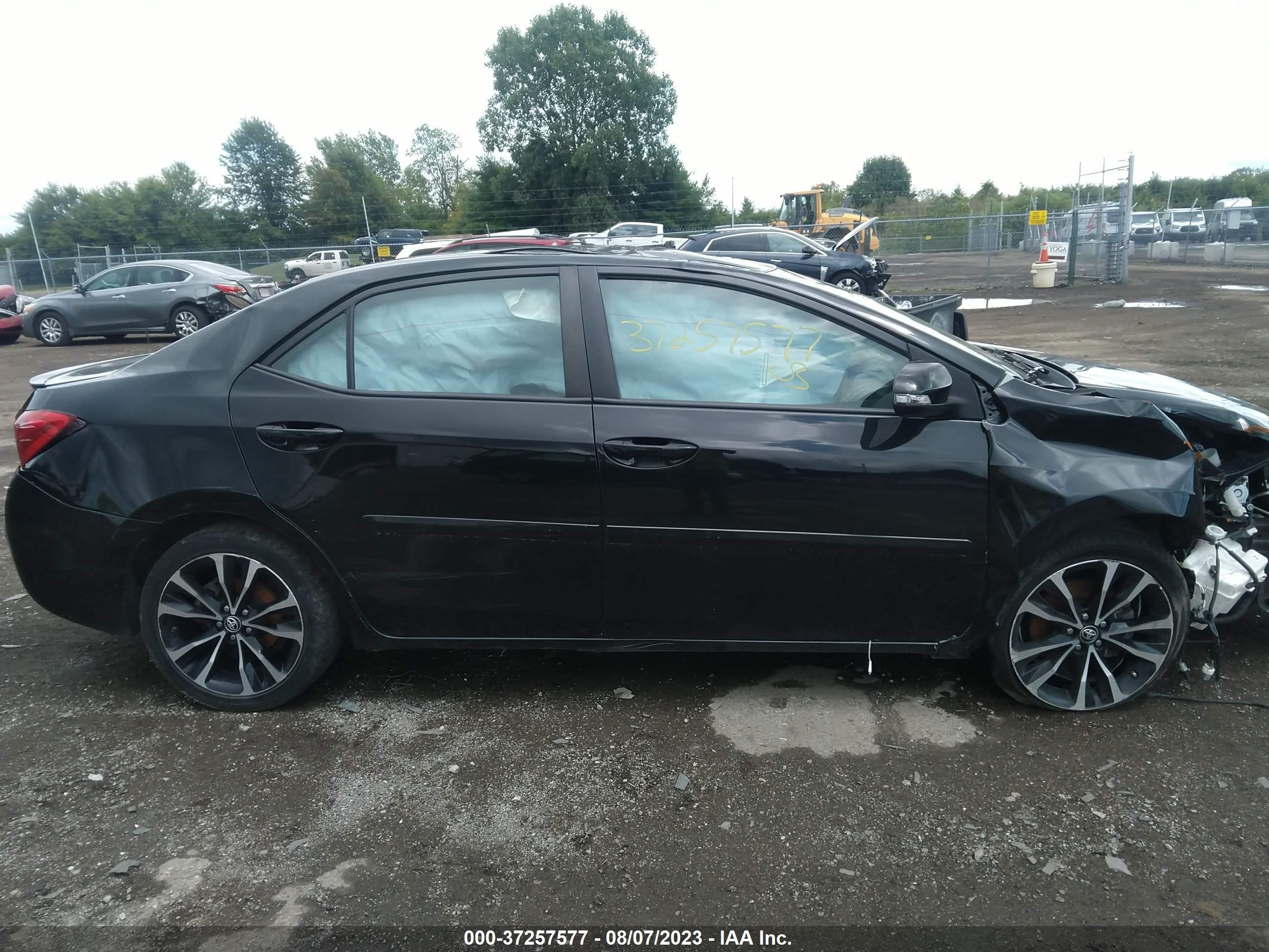 Photo 12 VIN: 2T1BURHE2KC220847 - TOYOTA COROLLA 