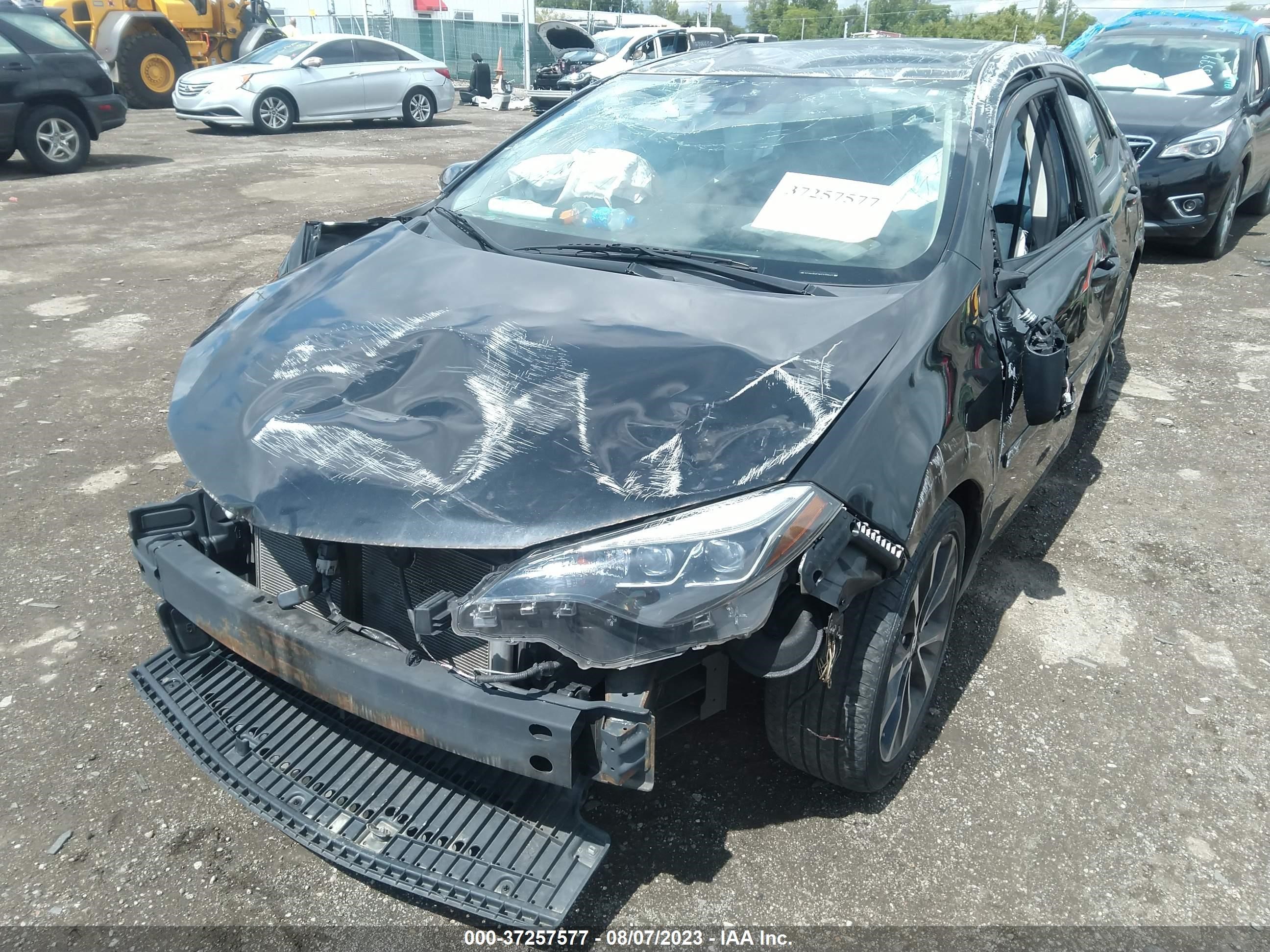 Photo 5 VIN: 2T1BURHE2KC220847 - TOYOTA COROLLA 