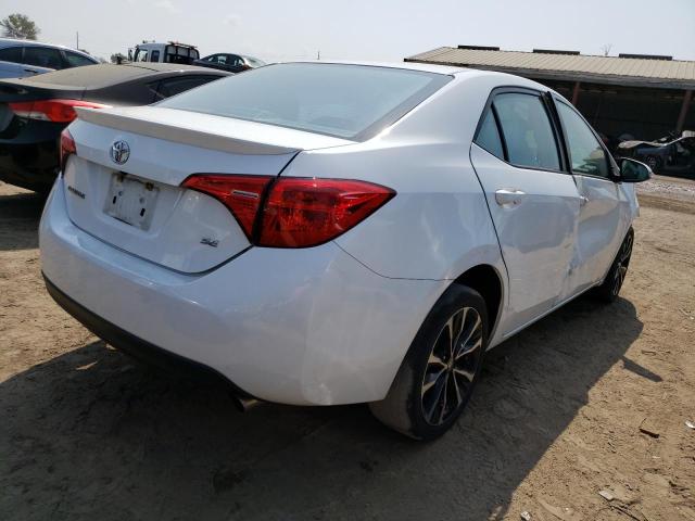 Photo 2 VIN: 2T1BURHE2KC226101 - TOYOTA COROLLA L 