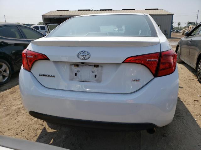 Photo 5 VIN: 2T1BURHE2KC226101 - TOYOTA COROLLA L 