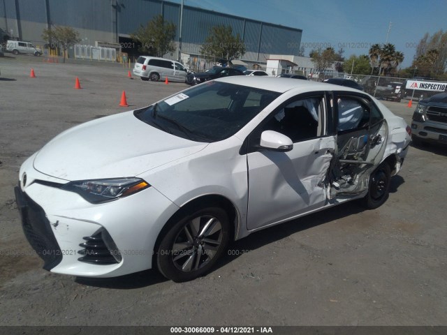 Photo 1 VIN: 2T1BURHE3JC098062 - TOYOTA COROLLA 