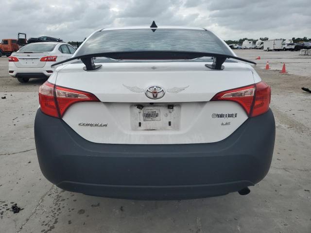 Photo 5 VIN: 2T1BURHE3JC969056 - TOYOTA COROLLA L 
