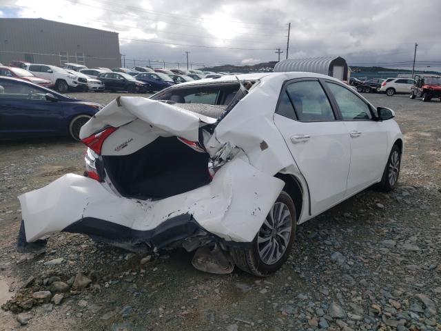 Photo 3 VIN: 2T1BURHE3JC976444 - TOYOTA COROLLA L 