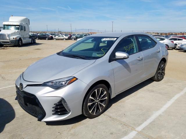 Photo 1 VIN: 2T1BURHE3KC131076 - TOYOTA COROLLA L 