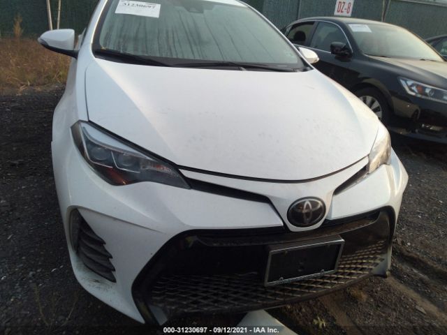 Photo 5 VIN: 2T1BURHE3KC138237 - TOYOTA COROLLA 