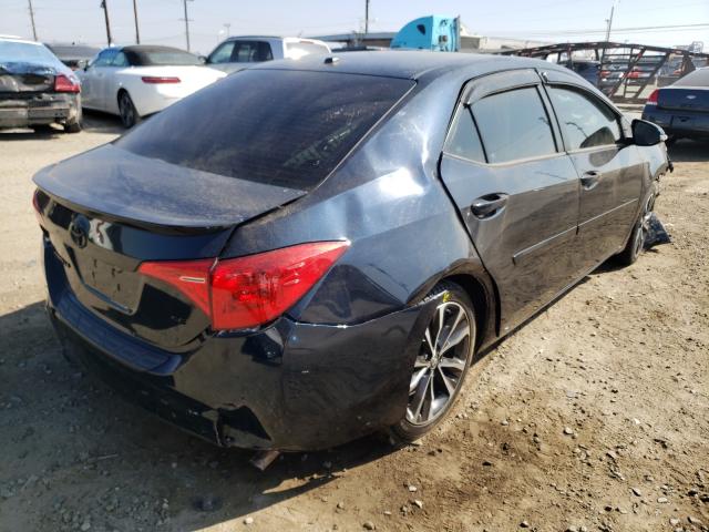 Photo 3 VIN: 2T1BURHE3KC201286 - TOYOTA COROLLA L 